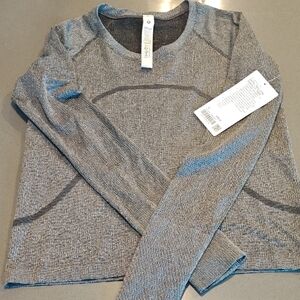 Lululemon Athletica Black and White Long Sleeve Top